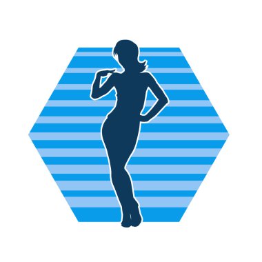 Dişi poziyonunda zayıf bir kadın modelinin silüeti. Çekici duruşu olan genç bir kadının silueti..