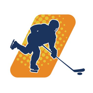 Hareketli bir buz hokeyi atletinin silueti. Buz hokeyi oynayan bir adamın silueti..