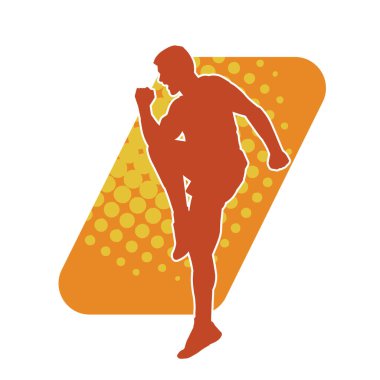 Sportif bir erkeğin silueti spor salonunda poz veriyor. Aerobik yapan zayıf bir adamın silueti..