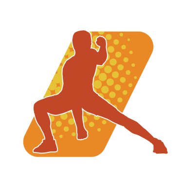 Sportif bir erkeğin silueti spor salonunda poz veriyor. Aerobik yapan zayıf bir adamın silueti..