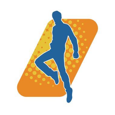 Poz veren bir erkek dansçının silueti. Dans eden bir adamın silueti.