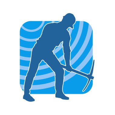 Görev sırasında baltayla dolaşan işçi kostümlü bir adamın silüeti. Bir madencinin hareket halindeki silueti balta aracı ile poz verir.