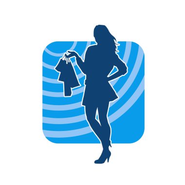 Sıska genç bir kadının silüeti alışveriş torbaları taşıyor.