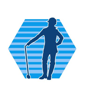 Çalışan bir işçinin silueti balyoz aletini kullanarak hareket halinde poz verir.