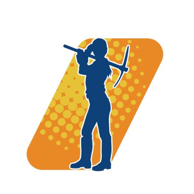 Bir inşaat işçisinin silueti kazma baltasıyla iş başında. Ağır işlerde çalışan bir madencinin silueti..