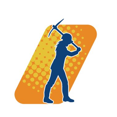 Bir inşaat işçisinin silueti kazma baltasıyla iş başında. Ağır işlerde çalışan bir madencinin silueti..