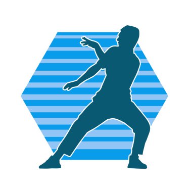 Hareket halindeki bir erkek dansçının silueti. Dans eden zayıf bir adamın silueti..