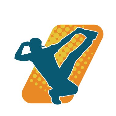 Hareket halindeki bir erkek dansçının silueti. Dans eden zayıf bir adamın silueti..