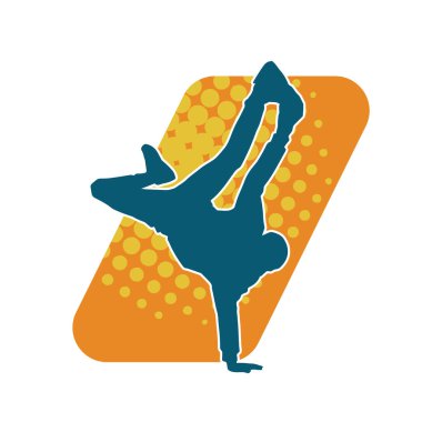 Poz veren bir erkek dansçının silueti. Dans eden bir adamın silueti.