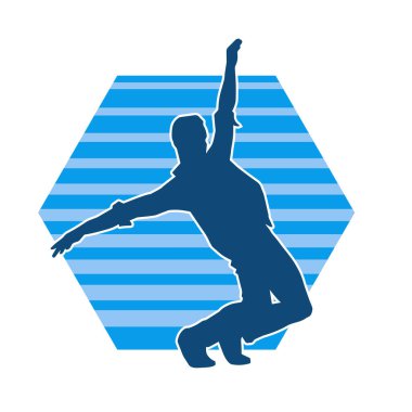 Dans eden bir adamın silueti. Erkek dansçı silueti poz veriyor..