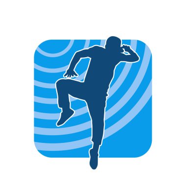 Dans eden bir adamın silueti. Erkek dansçı silueti poz veriyor..