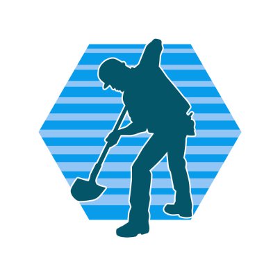 Kürek taşıyan bir işçinin silüeti. Bir işçinin hareket halindeki silueti kürek aracı kullanarak poz verir.