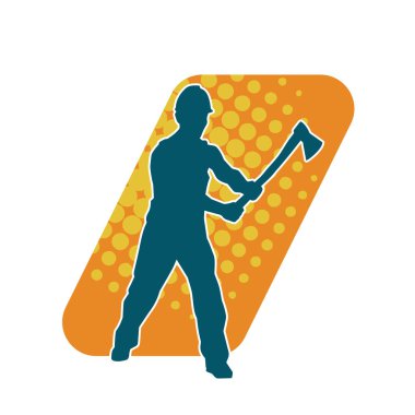 Hareket halindeki bir işçinin silueti, baltasını kullanarak poz verir..