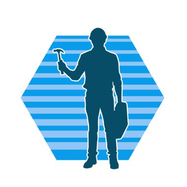 Çekiç aleti taşıyan bir işçinin silüeti. Hareket halindeki bir işçinin silueti çekiç aleti ile poz verir.