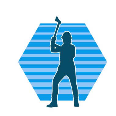 Hareket halindeki bir işçinin silueti, baltasını kullanarak poz verir..