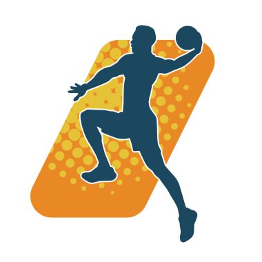 Aksiyon pozisyonunda bir basketbol sporcusunun silueti. Basketbol oynayan bir adamın silüeti..