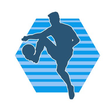 Top tekmeleyen bir erkek futbolcunun silueti. Hareket halindeki bir futbolcunun silueti.