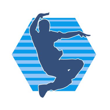 Poz veren bir erkek dansçının silueti. Dans eden bir adamın silueti.