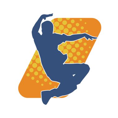 Poz veren bir erkek dansçının silueti. Dans eden bir adamın silueti.