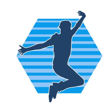 Hareket halindeki bir erkek dansçının silueti. Dans eden zayıf bir adamın silueti..