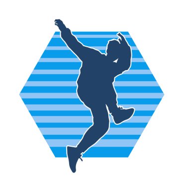 Hareket halindeki bir erkek dansçının silueti. Dans eden zayıf bir adamın silueti..