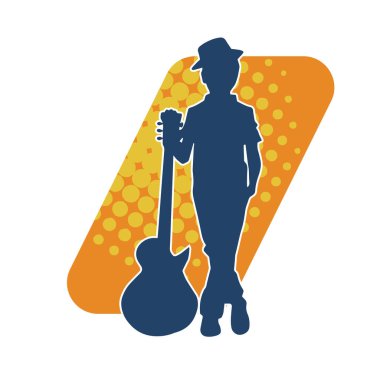 Akustik gitarlı genç bir çocuğun silueti. Akustik gitar enstrümanı olan genç bir müzisyenin silüeti..