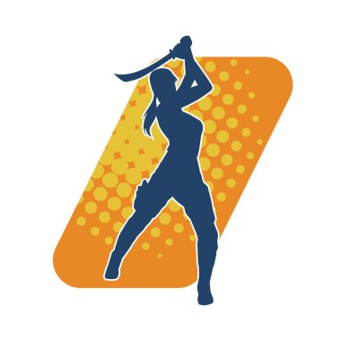 Bir kadın dövüşçünün silueti kılıç taşırken poz veriyor..