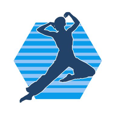 Poz vermiş bir balerin kadın silueti. Hareket halindeki bir balerin silueti..