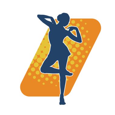 Poz vermiş bir balerin kadın silueti. Hareket halindeki bir balerin silueti..