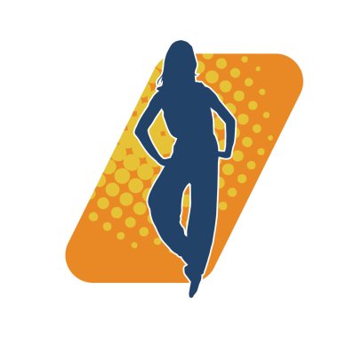 Poz vermiş bir balerin kadın silueti. Hareket halindeki bir balerin silueti..