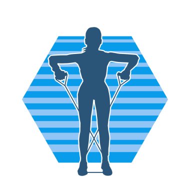 Spor salonundaki siluet kadın halat çekme egzersizi yapıyor..