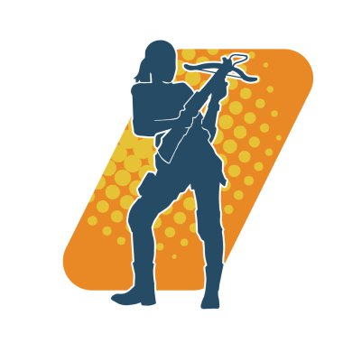 Makineli tüfek taşıyan bir kadın savaşçının silueti.