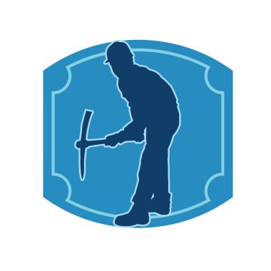 Görev sırasında baltayla dolaşan işçi kostümlü bir adamın silüeti. Bir madencinin hareket halindeki silueti balta aracı ile poz verir.