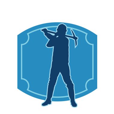 Görev sırasında baltayla dolaşan işçi kostümlü bir adamın silüeti. Bir madencinin hareket halindeki silueti balta aracı ile poz verir.