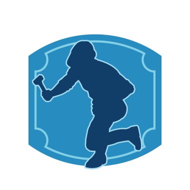 Çekiç aleti taşıyan bir işçinin silüeti. Hareket halindeki bir işçinin silueti çekiç aleti ile poz verir.