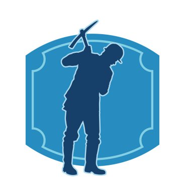 Görev sırasında baltayla dolaşan işçi kostümlü bir adamın silüeti. Bir madencinin hareket halindeki silueti balta aracı ile poz verir.