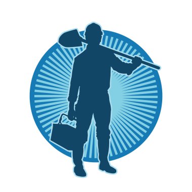 Kürek taşıyan bir işçinin silüeti. Bir işçinin hareket halindeki silueti kürek aracı kullanarak poz verir.