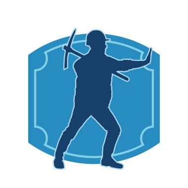 Görev sırasında baltayla dolaşan işçi kostümlü bir adamın silüeti. Bir madencinin hareket halindeki silueti balta aracı ile poz verir.