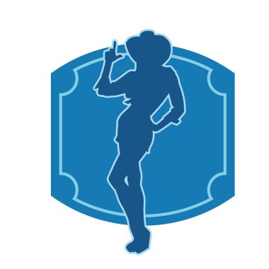 Kovboy kostümü giymiş bir kadın modelin silueti. Poz vermiş bir kovboy kızın silueti..