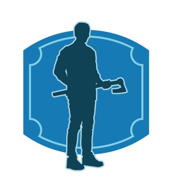 Geniş bir balta tutan bir erkeğin silueti. Elinde baltayla bir oduncunun silueti..