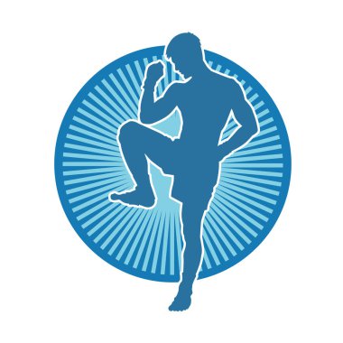Hareketli erkek kickboksör atletinin silueti. Tekme atan bir adamın silueti..
