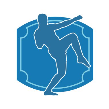 Hareketli erkek kickboksör atletinin silueti. Tekme atan bir adamın silueti..