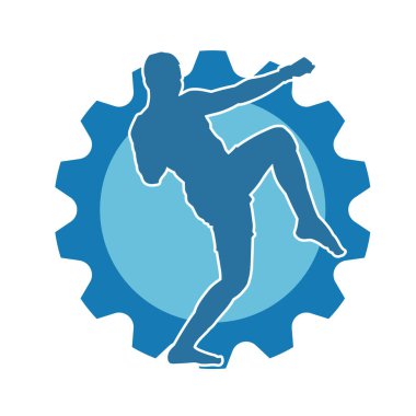 Hareketli erkek kickboksör atletinin silueti. Tekme atan bir adamın silueti..