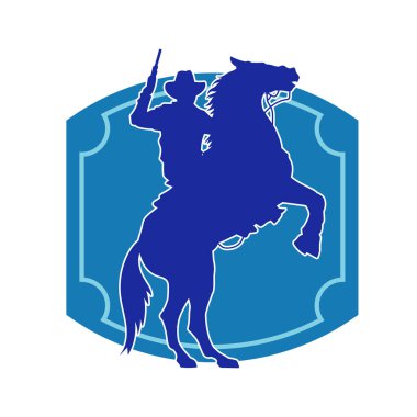 At süren ve silah taşıyan bir kovboyun silueti.