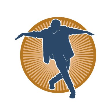 Hareket halindeki bir erkek dansçının silueti. Dans eden zayıf bir adamın silueti..