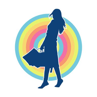 Sıska genç bir kadının silüeti alışveriş torbaları taşıyor.