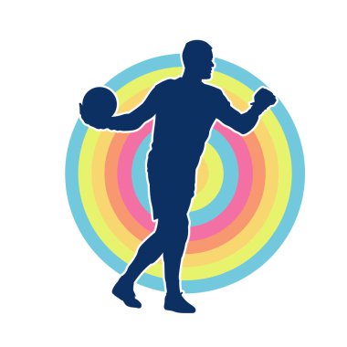 Top atan bir erkek futbolcunun silueti.