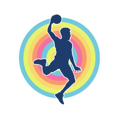 Hareketli bir erkek basketbolcunun silueti. Basketbol oynayan bir adamın silüeti..