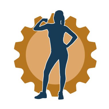 Sıska, sağlıklı bir kadının silüeti kol kasını gösteriyor. Vücut hatları iyi olan bir kadının silüeti..