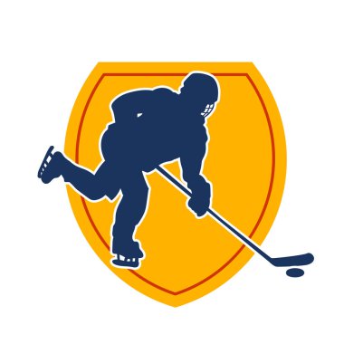 Hareketli bir buz hokeyi atletinin silueti. Buz hokeyi oynayan bir adamın silueti..